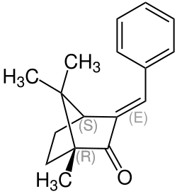 Strukturformel von (E)-(1S,4R)-3-Benzylidencampher