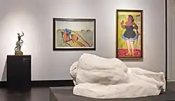 Gemälde links Wilhelm Morgner: Lehmarbeiter (1911), Museum Kunstpalast, Düsseldorf, rechts Georg Tappert: Kreolin (1911), Nationalgalerie (Berlin)