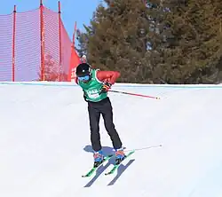 Qiu Xiyang beim Team-Ski-Snowboard-Cross-Wettbewerb