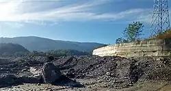 Am Fluss Laueni (Gleno) nahe dem Dorf Faulara