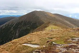 vom Größenberg (Größing) südwärts: Ameringkogel, hinten rechts Weißenstein, links Speikkogel; fern Koralpe