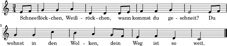  \language "deutsch" \relative c' { \key c \major \time 3/4 \autoBeamOff
{ \partial 4 e8[ f] | g4 g a | d, d d8[ e] | f4 f g | e2 e8[ f] |
g4 g c | h a g8[ f] | e4 f d | c2 \bar "|." }}
\addlyrics 
{ Schnee -- flöck -- chen, Weiß -- röck -- chen,
wann kommst du ge -- schneit?
Du wohnst in den Wol -- ken,
dein Weg ist so weit. }  

