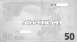 Rückseite bei 700&nbsp;nm: Die Seriennummer unten links verblasst, oben rechts nicht.