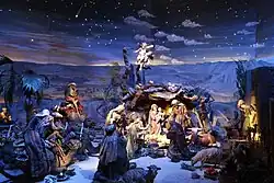 Krippendarstellung mit Geburtshöhle und Nachthimmel; die heiligen drei Könige besuchen das Jesuskind. Szene von Sebastian Osterrieder.