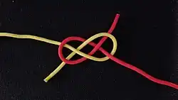 Einfacher Trossenstek (#1440) , der in Wirklichkeit den Schotstek zeigt.[1]