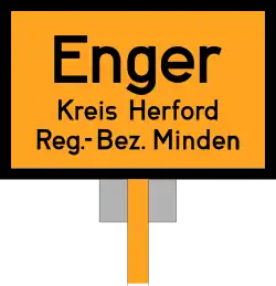 Bild d 1 Ortstafel (Vorderseite) – die auf 1000&nbsp;x&nbsp;650 Millimeter genormte Beispiel-Ortstafel von 1934