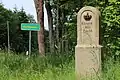 Restaurierter Postmeilenstein am oberen Ortseingang