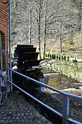 Von der Zahmen Gera betriebenes Mühlrad der Braunsteinmühle
