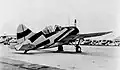 Eine F2A Buffalo der US Navy im experimentellen Dazzle camouflage (1940)