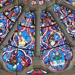 Zwei Apostel (innen), eine Frau wärmt sich am Feuer, ein Mann sitzt an einem reich gedeckten Tisch (außen)