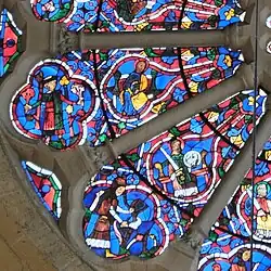 Ein Apostel und Johannes der Täufer (innen), ein Mann hält Blumen in den Händen, Reben werden geschnitten (außen)