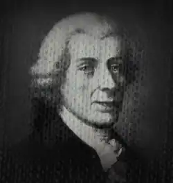 Gesicht nach vorn schauend ab Schulterblatt im Seitenprofil in schwarzweiß.