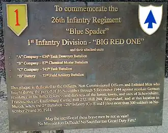 Gedenktafel für die am 29./30. November 1944 gefallenen Soldaten der 1.&nbsp;Infanterie-Division der US-Armee an einem Haus in Merode