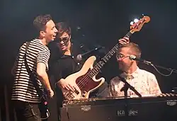 3 Personen. Cory Wong und Vulfpeck, eine Band