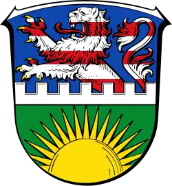 Bad Karlshafen: Aufgehende goldene Sonne mit hessischem Löwen