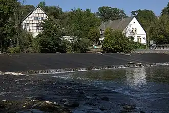 Denkmalzone Schliffgesmühle, an der Nahe, mit Gebäuden aus dem 19. Jahrhundert.