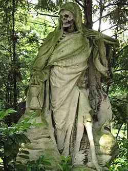 „Der Sensenmann“ mit Stundenglas. Grabplastik von August Schmiemann, Melaten-Friedhof, Köln, nach 1900