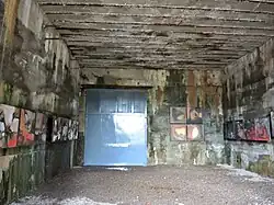 Der heute gesperrte Zugang zum eigentlichen Tunnel[10]