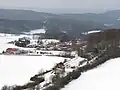 Winterliche Aussicht über Dieterode und das dahinter liegende Bergland