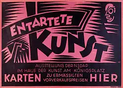 Infoblatt zur Ausstellung „Entartete Kunst“ am Königsplatz. Die schwarze Grafik mit vielen Dreiecken und einer Gesichtsmaske auf pinken Untergrund wirkt furchteinflößend.