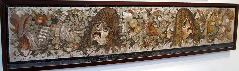 Masken, Laub und Früchte