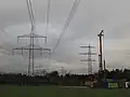 Vorbereitende Baumaßnahmen: Rückbau der 220-kV-Leitung zwischen Bürstadt und Wallstadt und Bau neuer Masten für DC-Betrieb
