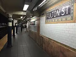 Als Mosaik gestal­teter Stations­name der IRT Lexington Avenue Line