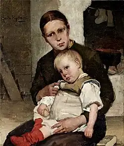 Kvinna med gosse i sitt knä