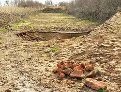 Suchschnitt nahe dem Grabhügel mit dem Fund von rotverziegelten Fragmenten eines prähistorischen Ofens, 2021