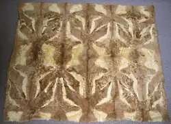 Quillango, typisches südamerikanisches Guanakoplaid mit den mitverarbeiteten Beinstücken