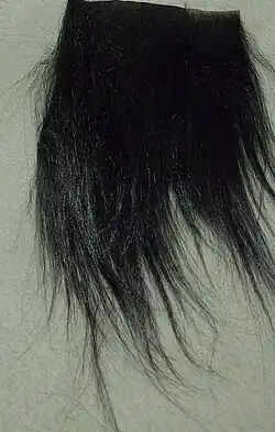 Guereza-Fellstückchen, Rest einer Pelzumgestaltung