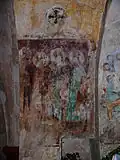 Freskenreste am linken Apsisbogen
