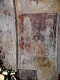 Freskenreste am rechten Apsisbogen