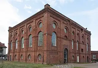 Kauen- und Verwaltungsgebäude, Maschinenhalle mit Fördermaschine, ehem. Werkstättengebäude, Einfriedung tlw. der Zeche Schlägel und Eisen 5/6, Scherlebecker Str.&nbsp;258