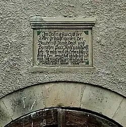 Haus Dais mit historischer Inschrift