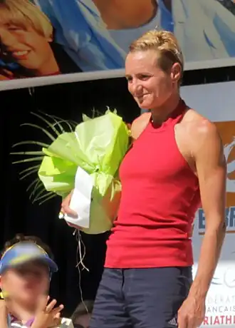 Isabelle Ferrer bei der Siegerehrung des Embrunman, 2014