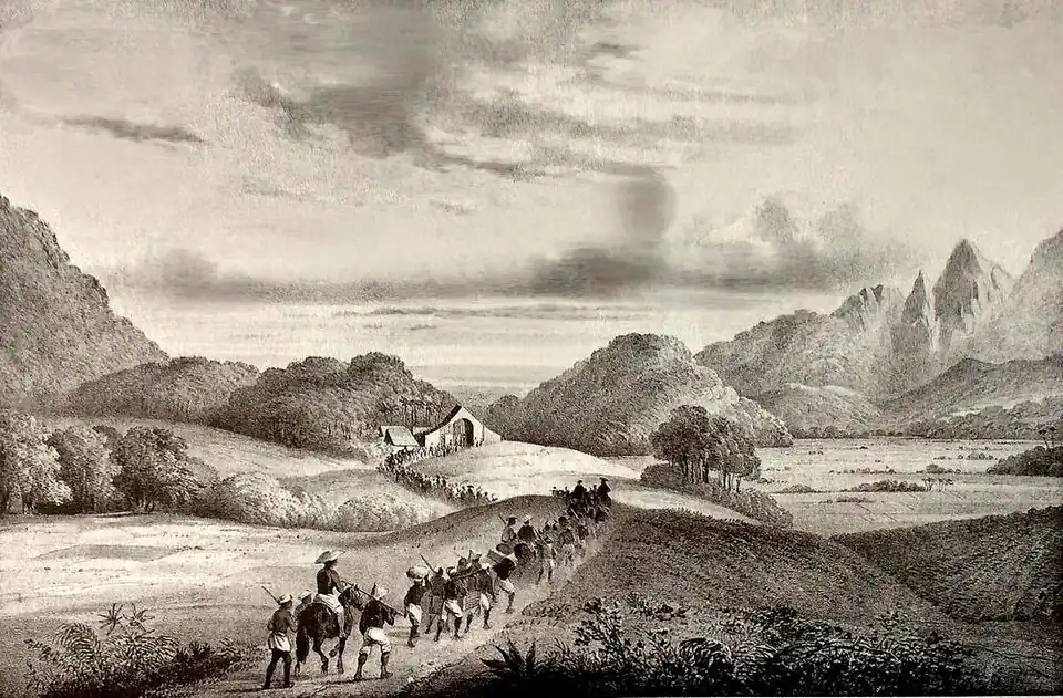 Dienstreisen von hohen Persönlichkeiten wurden für gewöhnlich von zahlreichen Dienern und Trägern begleitet. Diese Ansicht ist aus dem Werk von C. W. M. van de Velde Gezigten uit Neerlands Indie (Amsterdam 1845) entnommen. Der Titel der Ansicht lautet: „Aankomst van het posthuis te Pandat“ (Ankunft im Posthaus zu Pandat).[54] In solchen Stationen konnten die Pferde gewechselt werden.