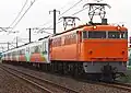 EF65 123 nunmehr in der orangen Yuyu Salon Okayama-Farbgebung