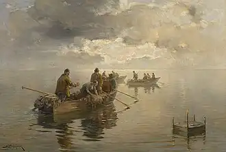 Chiemseefischer im dunstigen Licht am frühen Morgen