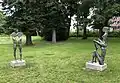 Maskenpaar 1 und Maskenpaar 2, Bronzeguss, Schlosspark Essingen