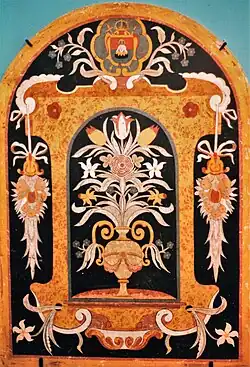 Blumenkomposition mit Wappen des Fürststifts