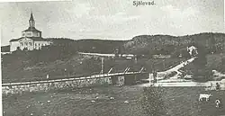 Die neue Kirche und die alte Brücke in Själevad zwischen 1876 und 1930