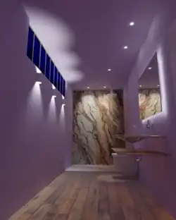 Artikulation der Architektur: Durch die Ausleuchtung der Wände erscheint der schmale Raum weiter, als er ist.