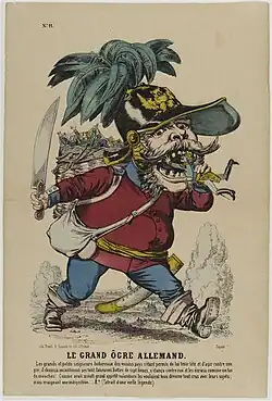 In der französischen Karikatur hält ein riesenhafter König Wilhelm&nbsp;I. in einer Kiepe mehrere deutsche Fürsten gefangen. Er führt ein großes Messer mit sich und ist im Begriff, das erste gekrönte Haupt zu verspeisen. Die Karikatur spielt auf die preußischen Annexionen 1866 an. „Le grand ogre allemand“ (Der große deutsche Menschenfresser, Darstellung von Alphonse Lévy, Musée des Civilisations de l’Europe et de la Méditerranée)