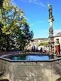 1910, Brunnenfigur Lindenhöflerin auf dem Lindenhofbrunnen in Zürich