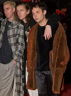 Rechts Velourslamm-Herrenmantel (2017)