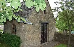 Die Marienkapelle ist eine bruchsteinerne Wegekapelle mit Ummauerung aus dem Jahre 1937 an der heutigen Kapellenstraße gelegen. Sie wurde von der Marmagener Familie Knoll als Dank für die Genesung von schwerer Krankheit erbaut.