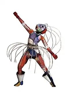 Maskenfigur „Toboggan Frau“ (1920er)