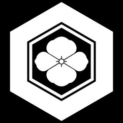 Wappen der Shiiya-Hori (Schildkrötenpanzer mit Blume)[10]