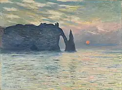 Claude Monet, La falaise d'Étretat, soleil couchant, 1883, 55,2 × 80,6&nbsp;cm., North Carolina Museum of Art